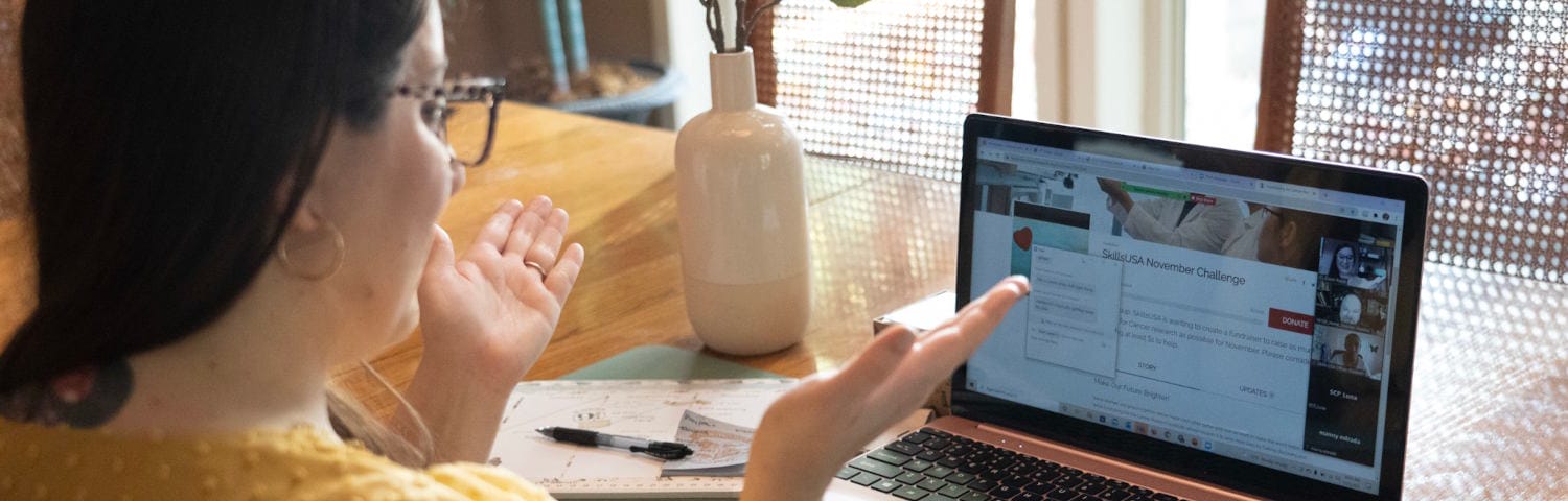 High school student attending to an online class